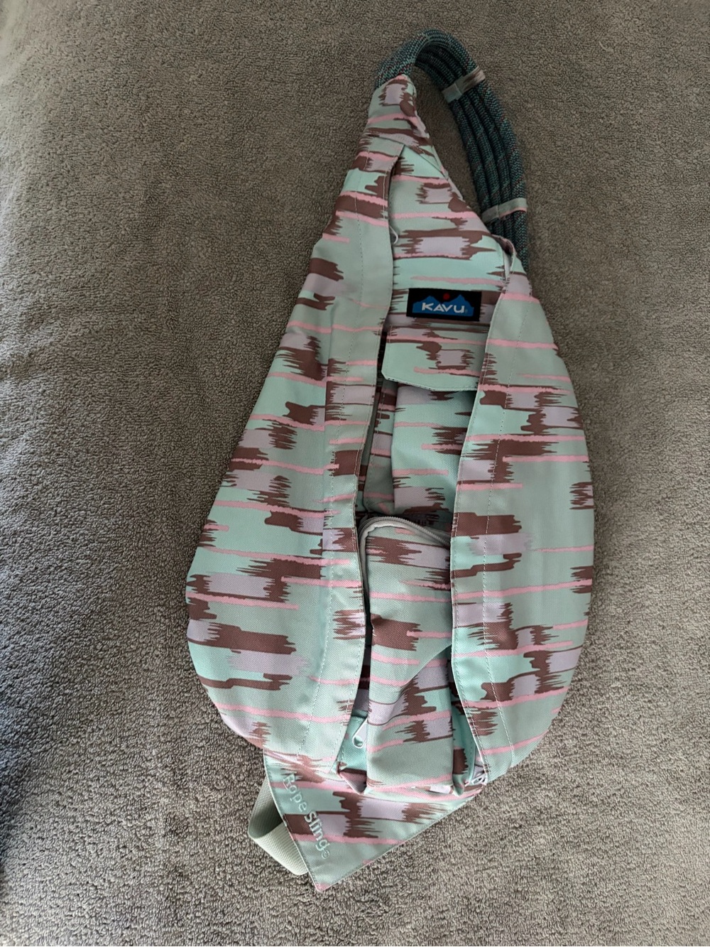 Kavu Rope Sling Bag in Teal, Pink & Brown Abstract Print